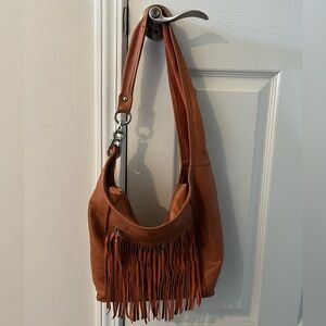 Innue leather shoulder bag medium size with fringe detail and silver hardware